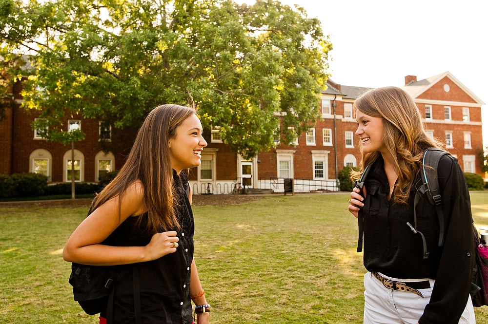 Two UGA students talking on campus