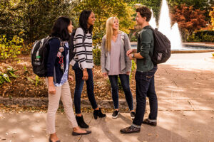 Group of students talk on the UGA campus